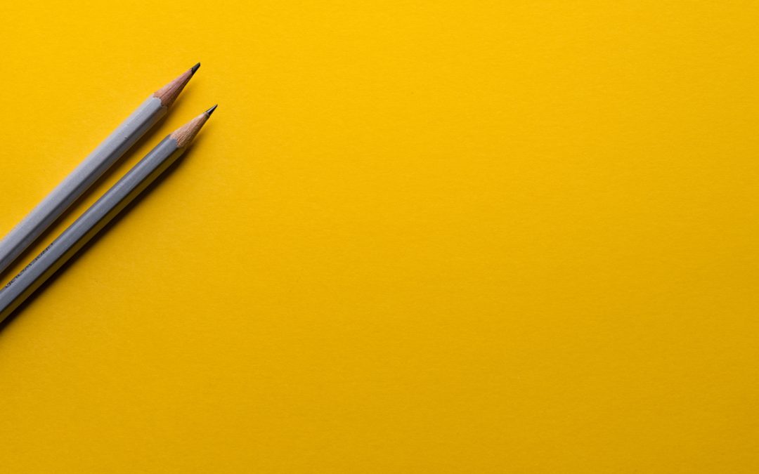 Image of pencils on yellow background