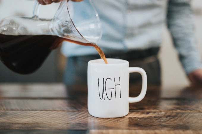 Image of a coffee cup that says "Ugh"