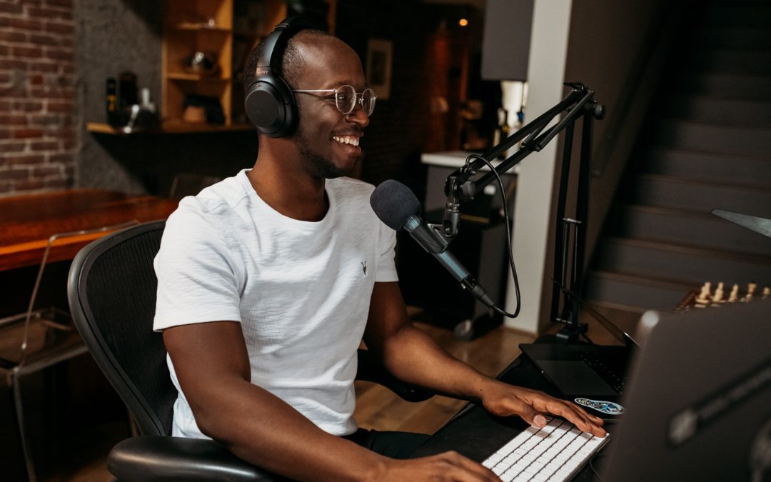 Image of a person podcasting