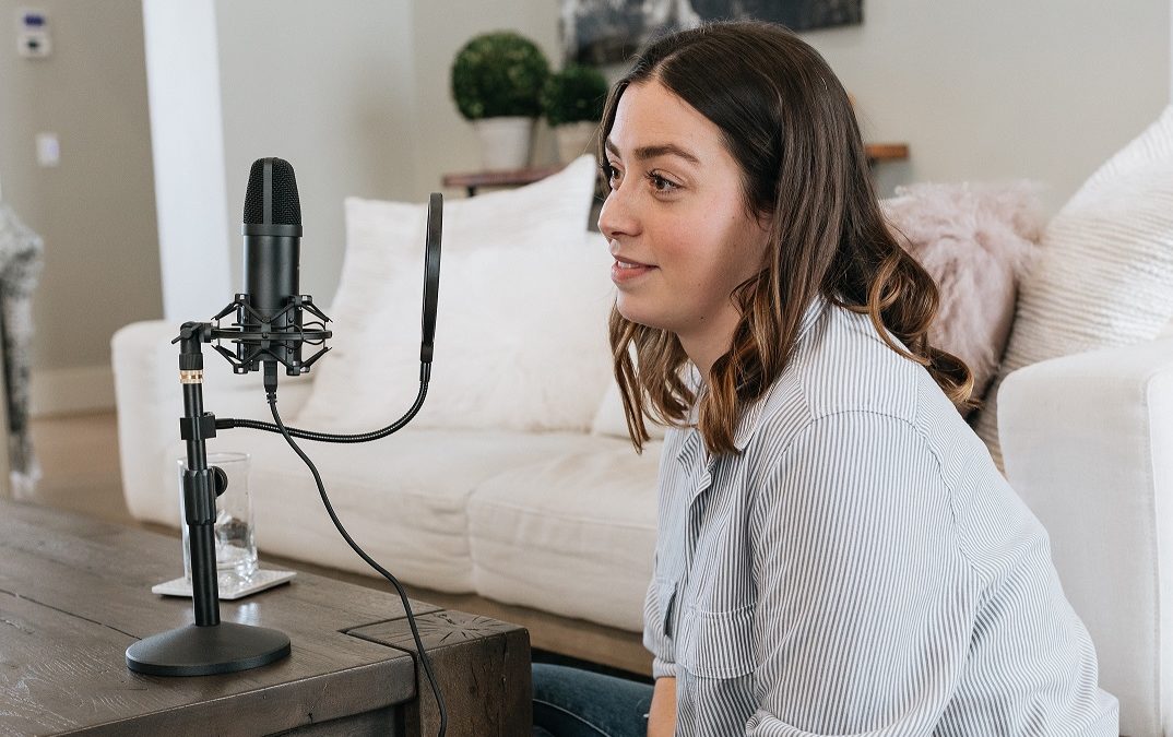 Picture of an individual podcasting