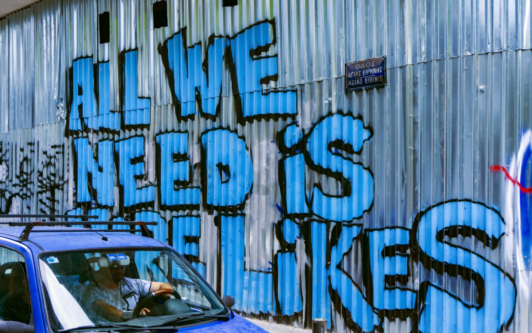 Graffiti that says "All We Need Is Likes"