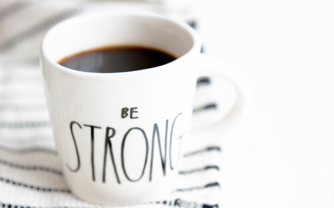 Image of a coffee cup that says 'Be Strong'